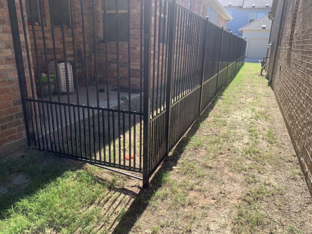 Wrought Iron Fence with Puppy Panels